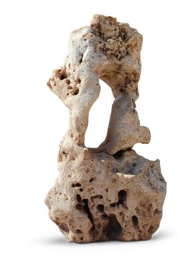 Solitérny kameň s dierami, podpilený